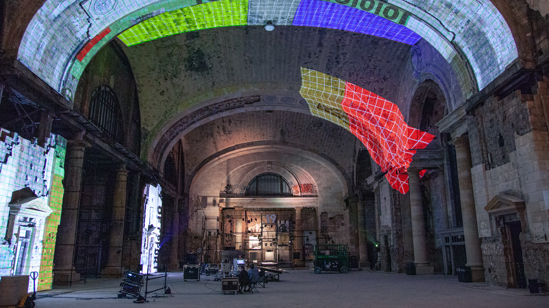 behind the scenes of interactive installation, large vaulted ceiling projection mapped, for detroit installation