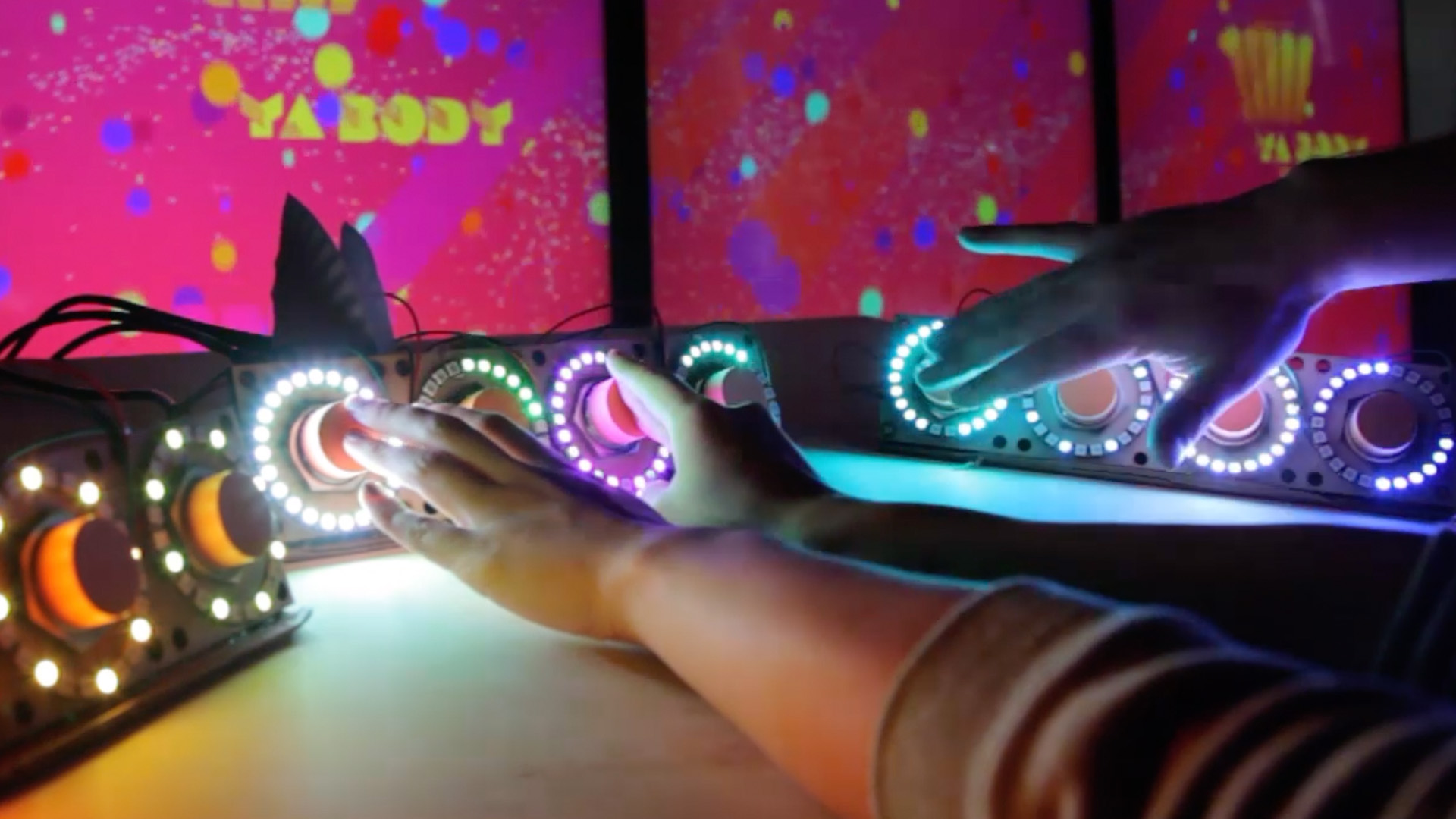 behind the scenes of interactive installation, testing touch sensors with led rings lighting up when touched, trolls project