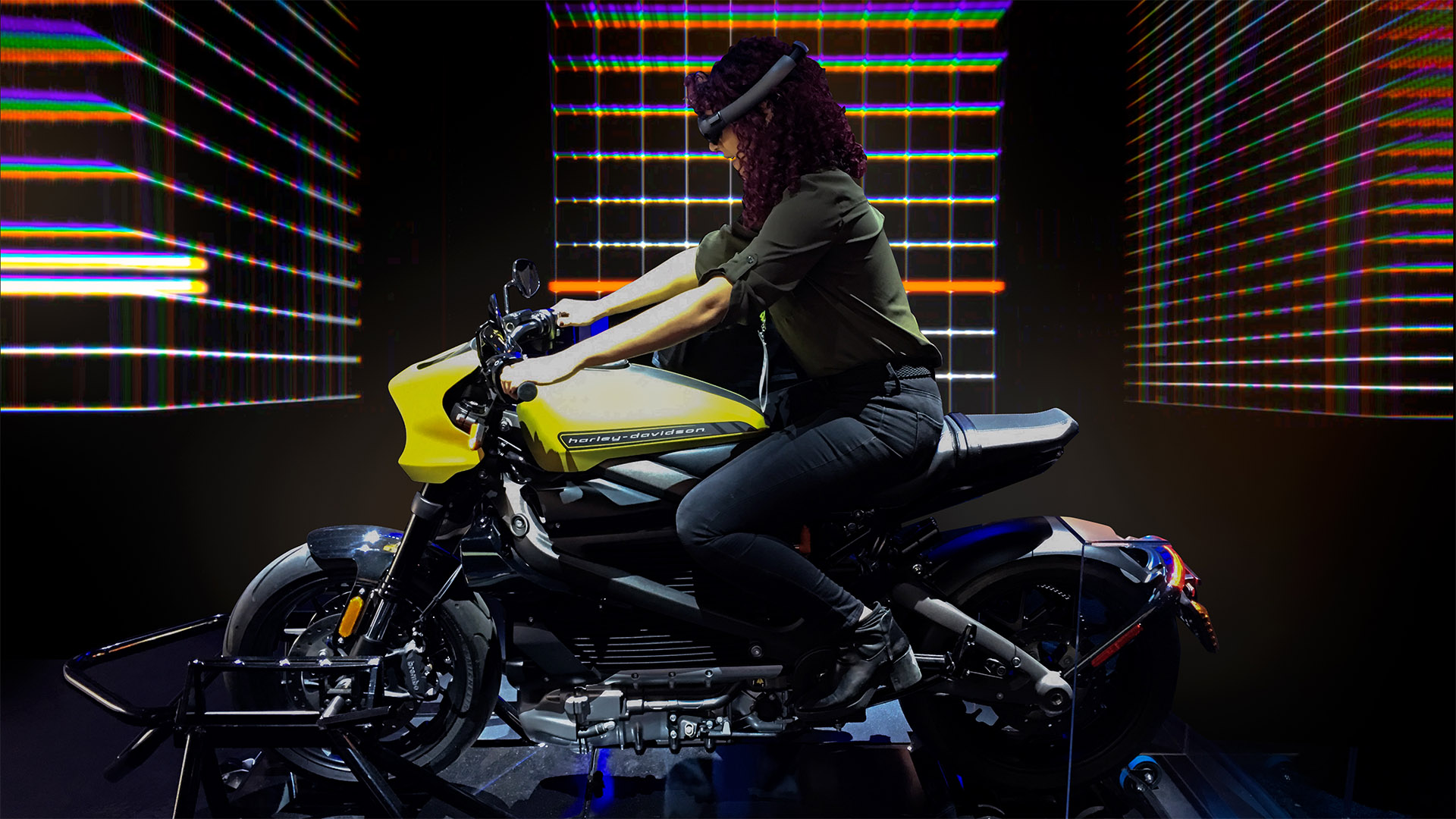 Woman sits on top of LiveWire motorcycle