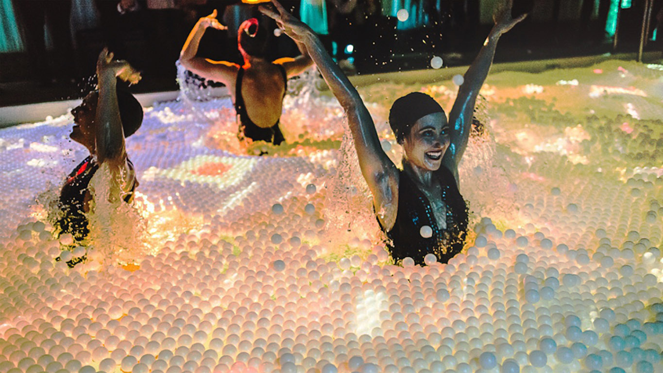 Pool Party - 65,000 Ping Pong Balls in a Projected Pool