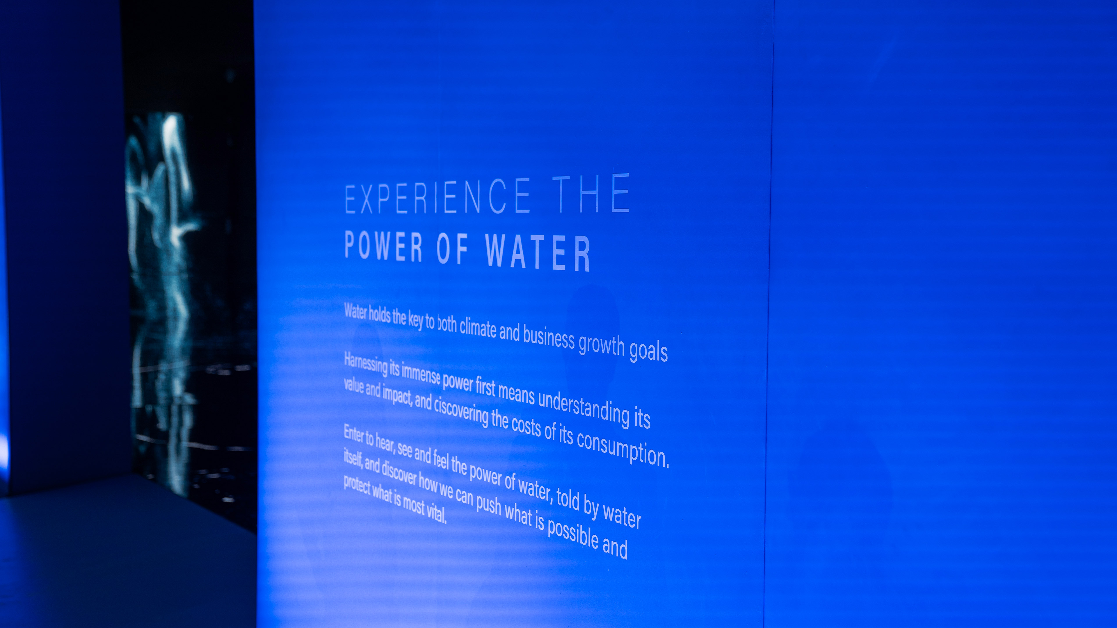 A photo of a text description of the interactive installation 'Experience the Power of Water'